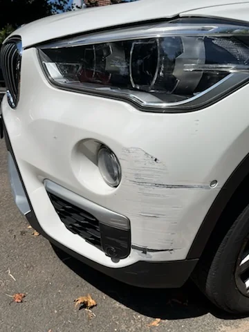 Vehicle panel before mobile paint repair in Sydney